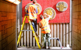 Work is in progress to restore the public art in Colchester's Southway subways.  The concrete art murals were placed in the subways to brighten up the area in the 1970s.  The murals by sculptors  Henry Collins and Joyce Pallott, the husband and wife team who lived and worked in Colchester have weathered the passage of time well, but were in need of restoration.
Colchester Civic Society and Colchester In Bloom started fundraising in 2014 to raise the funds needed.  Essex Heritage Trust gave a grant for the initial restoration of the Abbeygate Mural. Now with an award of funds from the Heritage Lottery which was made possible by National Lottery players, and an additional grant from The Harvey Benham Trust the restoration of all of these murals is ensured.  The murals were made by making a detailed reverse mould and filling that with concrete. Working to brighten up the St Botolphs Roundabout subway.